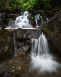 View of waterfall in forest