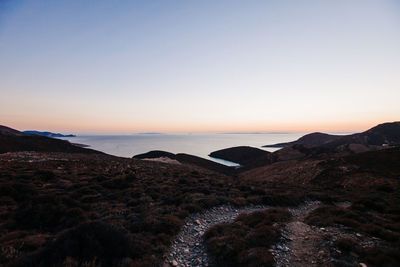 Scenic view of sea against clear sky during sunset