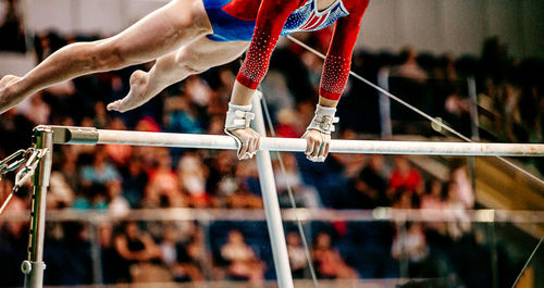 Low section of gymnast performing gymnastics