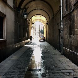 Narrow alley amidst buildings