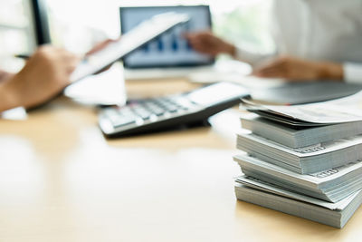 Stack of laptop on table