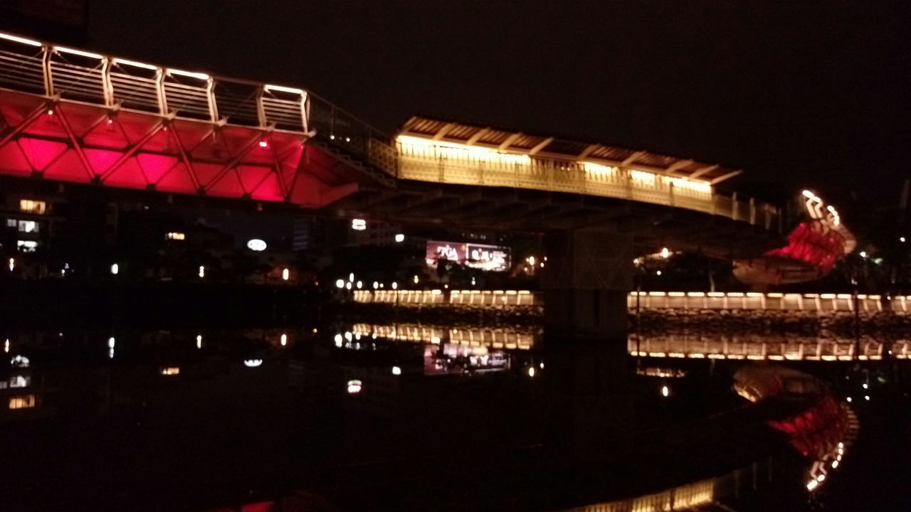 illuminated, night, architecture, built structure, building exterior, transportation, city, city life, travel, lighting equipment, bridge - man made structure, travel destinations, large group of people, incidental people, famous place, architectural column, connection, outdoors, arts culture and entertainment