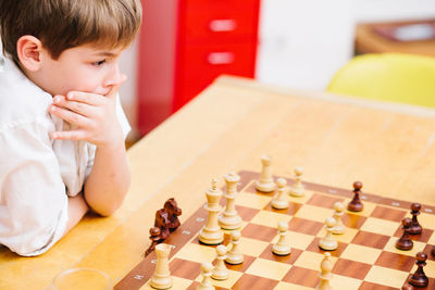 Full length of baby boy playing on table