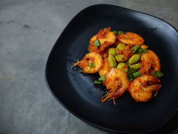 High angle view of meat in plate on table
