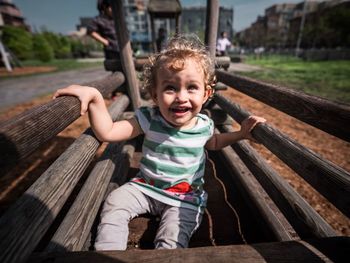 Portrait of cute boy smiling in playground