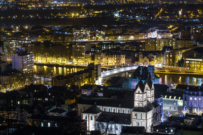 High angle view of illuminated buildings at night