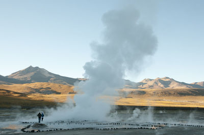 Hot spring against sky