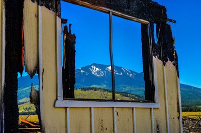 Low angle view of built structure against blue sky