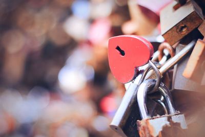 Close-up of padlocks on heart shape