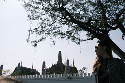 Panoramic view of temple and building against sky