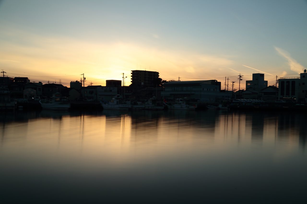 VIEW OF CITY AT SUNSET