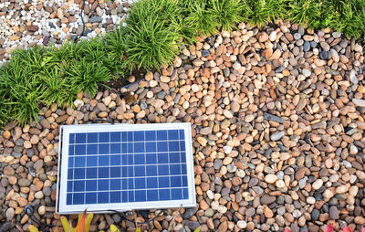 High angle view of stones and pebbles on ground