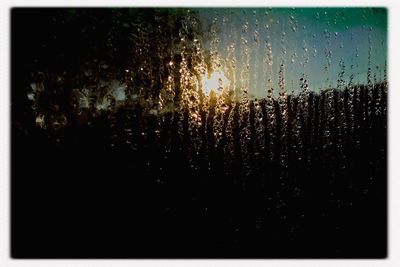 Close-up of raindrops on glass window