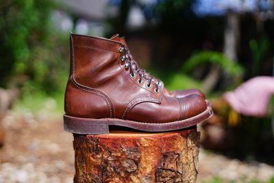 Close-up of shoes on wood