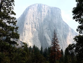 Low angle view of majestic mountains against sky