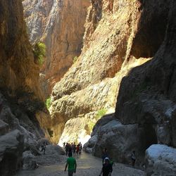 Tourists on rock formation