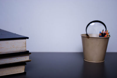 Close-up of school supplies on table