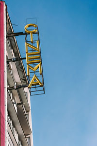 Low angle view of building against clear blue sky