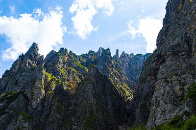 Low angle view of mountains against sky