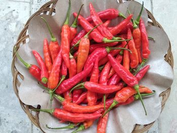 High angle view of red chili peppers on table