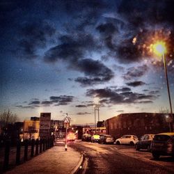 Cars on street at night