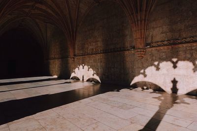 Shadows of columns on historic building