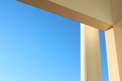 Low angle view of building against blue sky