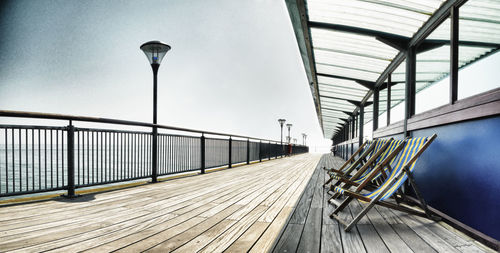 Footbridge against sky