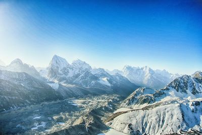 Scenic view of mt everest against blue sky