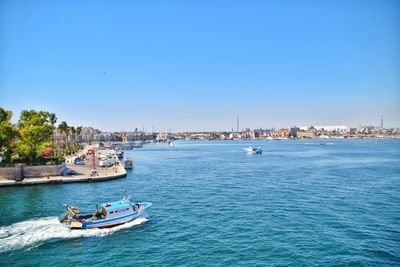 Scenic view of sea against clear blue sky