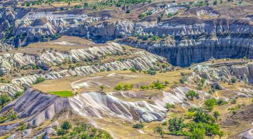 Bizarre rock formations of volcanic tuff and basalt in cappadocia, turkey