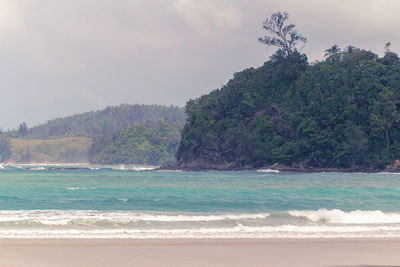 Scenic view of beach against sky