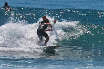 Man surfing in sea