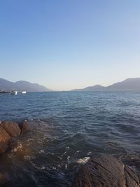 Scenic view of sea against clear sky