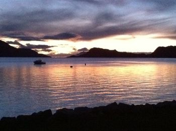 Scenic view of lake during sunset