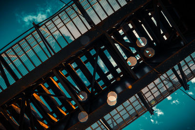 Low angle view of spiral staircase against sky