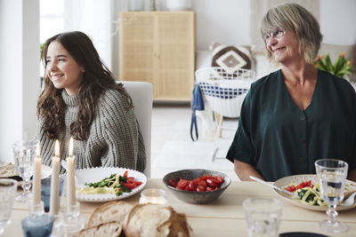 Family eating dinner at home together