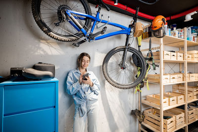 Portrait of young woman using smart phone