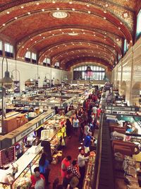 People at market in city