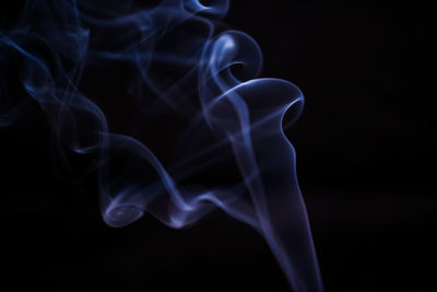 Close-up of smoke against black background