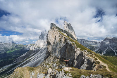 Scenic view of rocks and mountains against sky