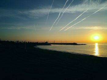 Scenic view of silhouette landscape against sky during sunset