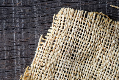 Directly above shot of burlap on wooden table