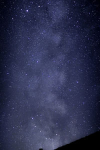 Low angle view of stars against sky at night