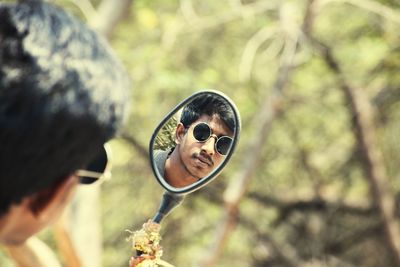 Close-up of man wearing sunglasses