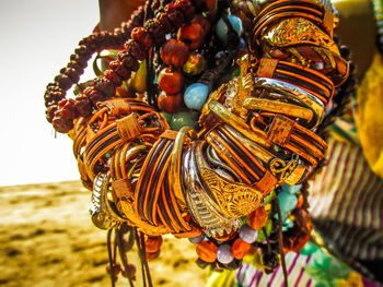 Close-up of multi colored jewelry for sale