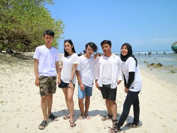 People standing on beach