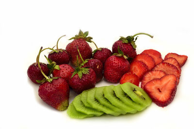 Close-up of strawberries against white background