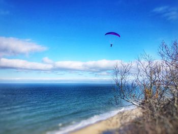 Scenic view of beach against blue sky