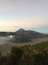 View of volcanic landscape against sky